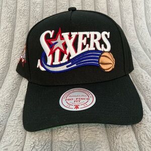 Sixers: Mitchell & Ness Black Sixers Cap with Red and Blue Accents